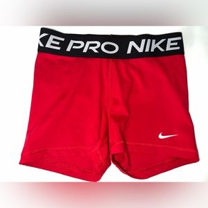 Red Nike pros. Size small